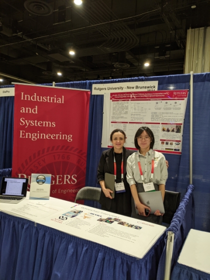 Rutgers ISE team members at a information booth.